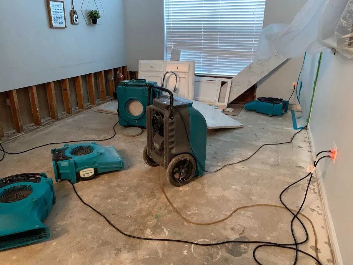 Dehumidifier in flood-cut room for Water Extraction & Removal in Livonia